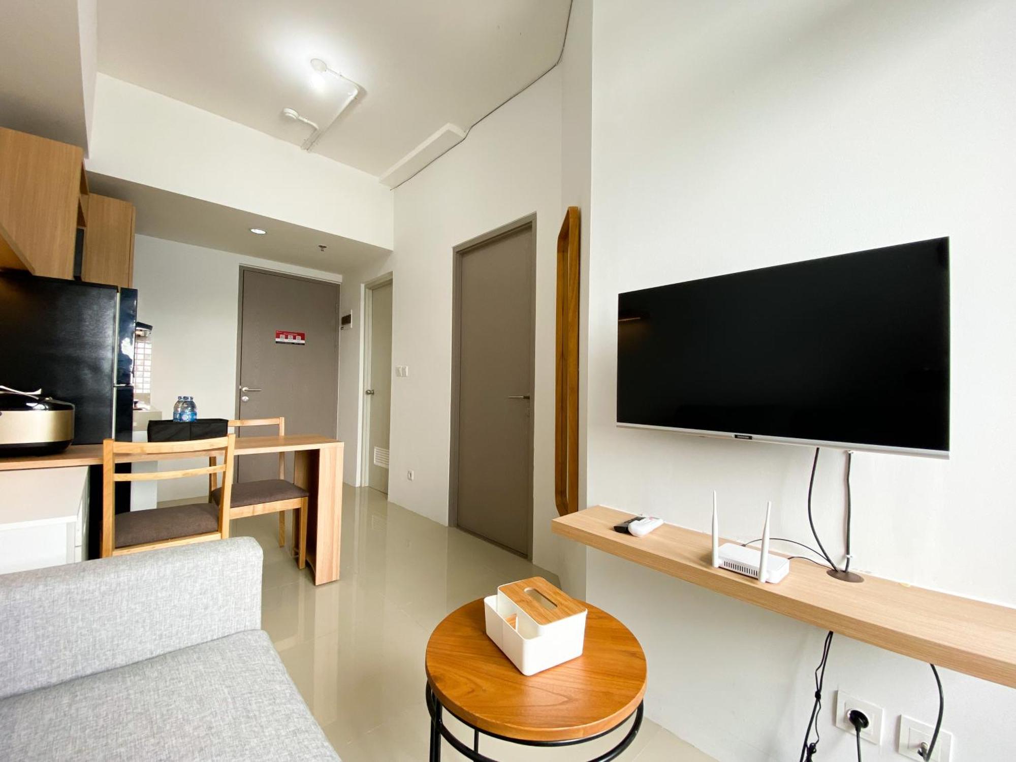 Apartemen Homey 1br At Vasanta Innopark By Travelio