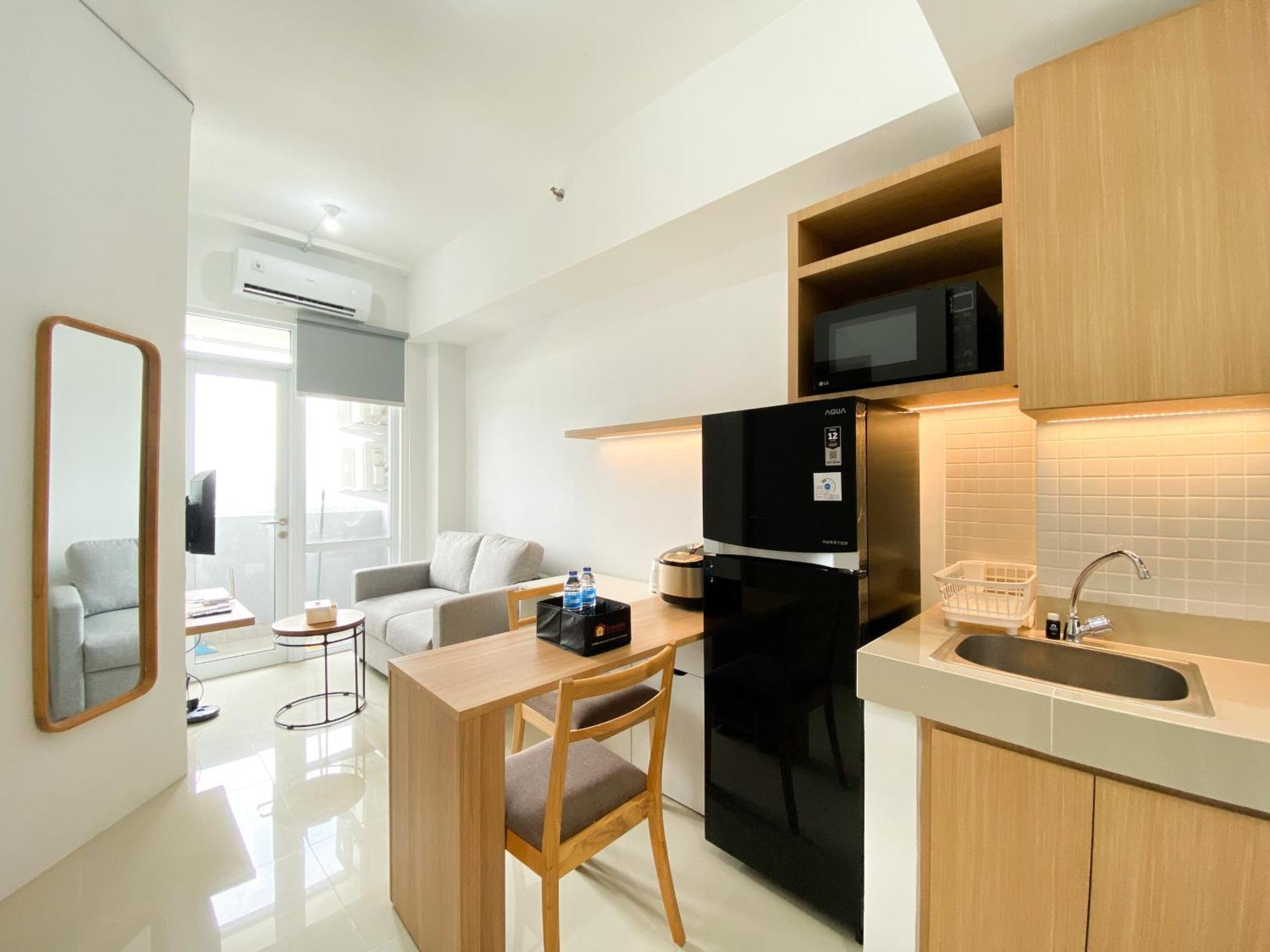 Apartemen Homey 1br At Vasanta Innopark By Travelio *